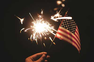 american flag and fireworks